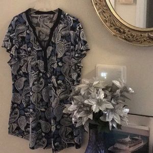 Paisley sets the tone for this soft and comfy navy blue, black, and white top.
